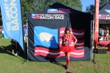 The Great American Bacon Race participants pose for the camera after a sizzlin' race.