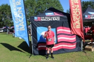 The Great American Bacon Race participants celebrate with photos and laughter, but mostly bacon, as they show off their Bacon themed medals. Mackenzie placed as one of the fastest participants in her age and gender category, granting her the prized Golden Pig.